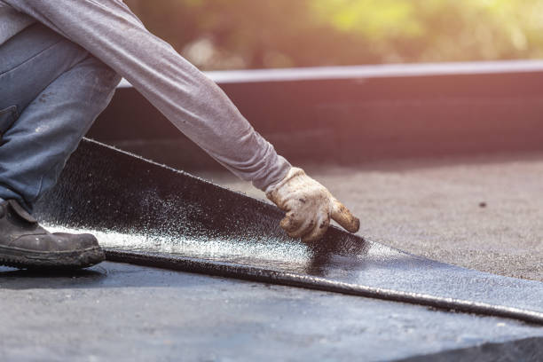 Professional Waterproofing technician working in Wellington, OH
